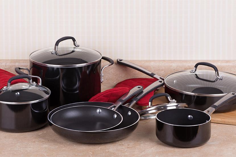 a black cookware set of 4 lidded pots and 2 frying pans 1 4 2 6 1 2