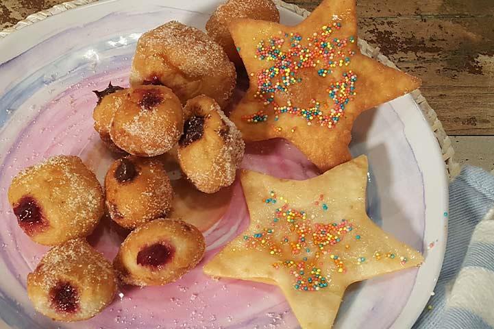 An image of sweet fried dough on a plate.