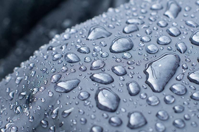 liquid beading up on water resistant black fabric