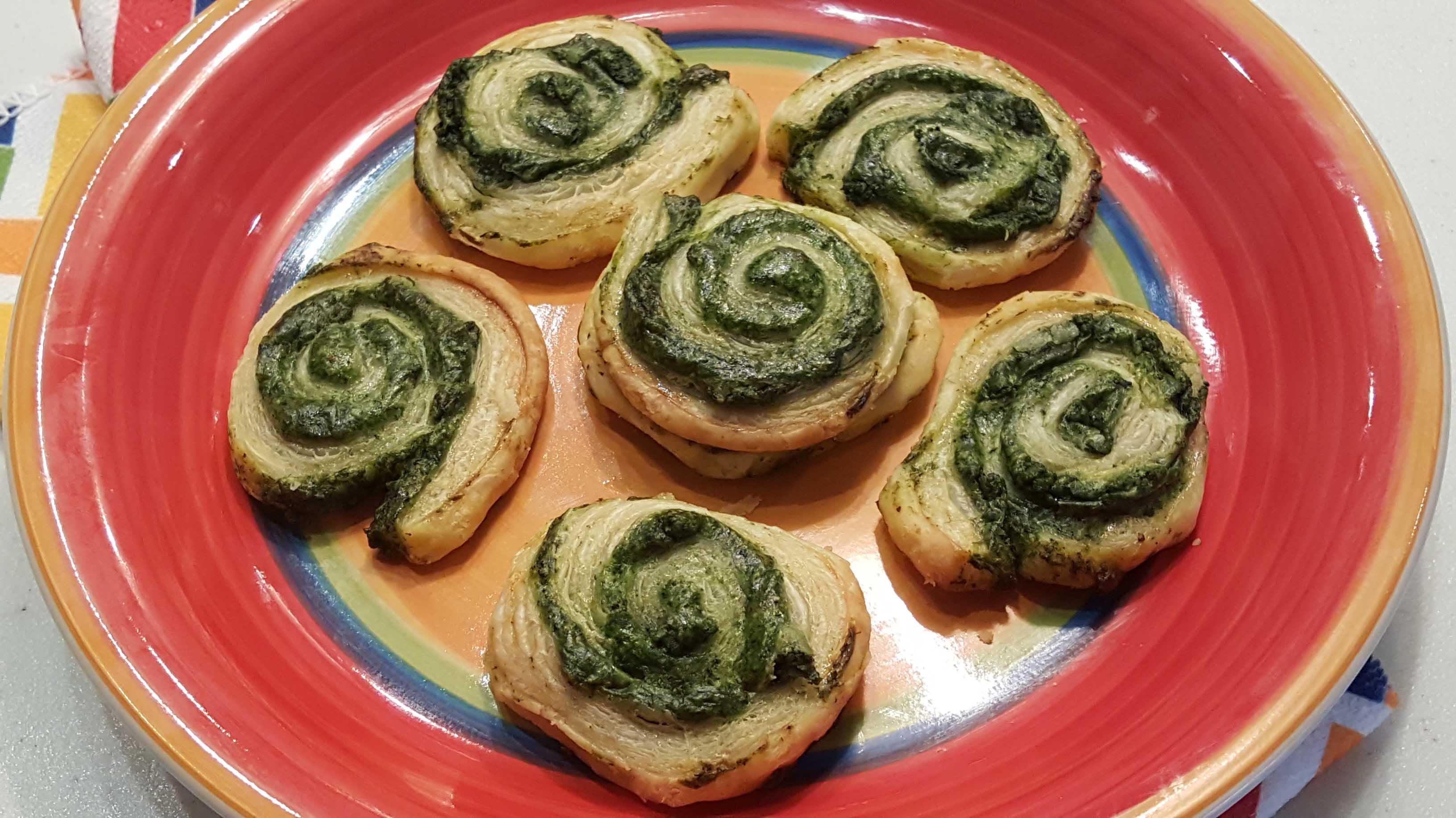Green Vegetable Pinwheels on a plate.